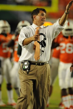 University of Miami Hurricanes head coach Al Golden leads his team on the field in a game against the Boston College Eagles at Sun Life Stadium on...