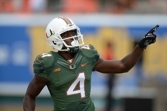 University of Miami Hurricanes wide receiver Phillip Dorsett #4 catches a touchdown pass from quarterback Brad Kaaya in a game against the Arkansas...