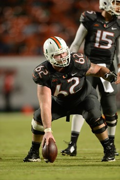 University of Miami Hurricanes offensive lineman Shane McDermott #62 plays in a game against the Duke Blue Devils at Sun Life Stadium on September 27,...