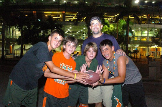 University of Miami Hurricanes fans show their team spirit in a game against Charleston Southern University in the Canes inaugural game at Dolphin...