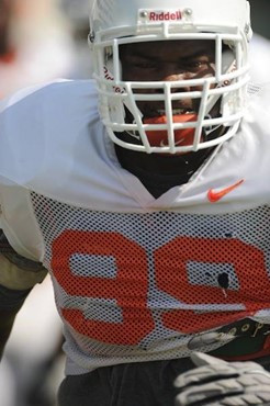 University of Miami Hurricanes defensive lineman Marcus Forston #99 practices at Greentree Practice Field on August 13 in afternoon drills to prepare...
