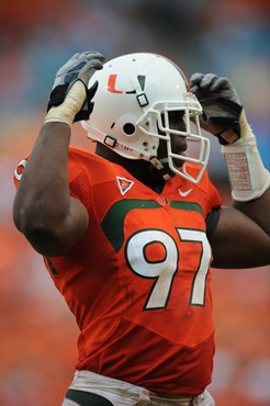 University of Miami Hurricanes defensive lineman Adewale Ojomo #97 gets fans into the game after the defense shut down the North Carolina Tar Heels in...