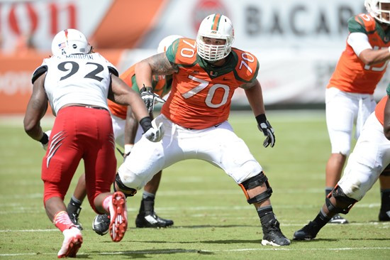 University of Miami Hurricanes offensive lineman Jonathan Feliciano #70 plays in a game against the Cincinnati Bearcats at Sun Life Stadium on October...