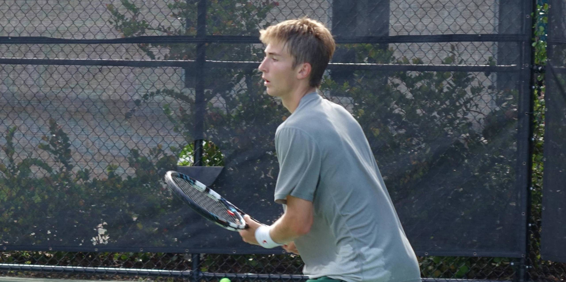 Piotr Lomacki Falls to Top Seed at ITA