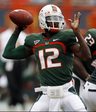 Miami quarterback Jacory Harris prepares to pass against Duke during the first quarter of an NCAA college football game in Miami, Saturday, Nov. 21,...