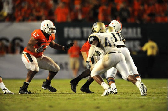 University of Miami Hurricanes offensive lineman Tyrone Byrd #67 gets set to block in a game against Charleston Southern University in the Canes...