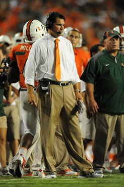 University of Miami Hurricanes head coach Al Golden calls in a play in a game against the Ohio State Buckeyes at Sun Life Stadium on September 17,...