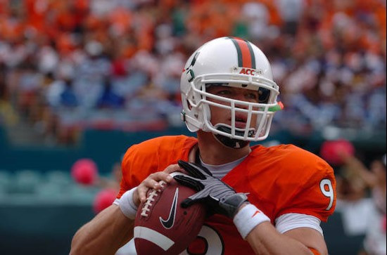 University of Miami Hurricanes quarterback Robert Marve #9 warms up on the sidelines during a game against the University of Central Florida Knights...