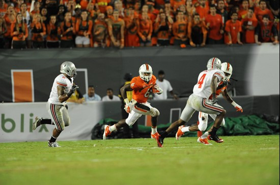 University of Miami Hurricanes running back Lamar Miller #6 carries the ball against the Ohio State Buckeyes at Sun Life Stadium on September 17,...