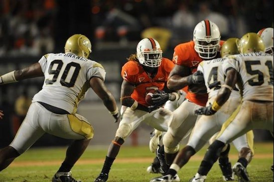University of Miami Hurricanes running back Graig Cooper #2 carries the ball in a game against the Georgia Tech Yellow Jackets at Land Shark Stadium...