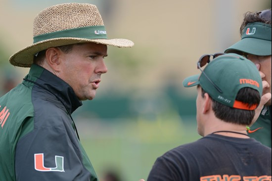 Al Golden talks with new offensive coordinator James Coley