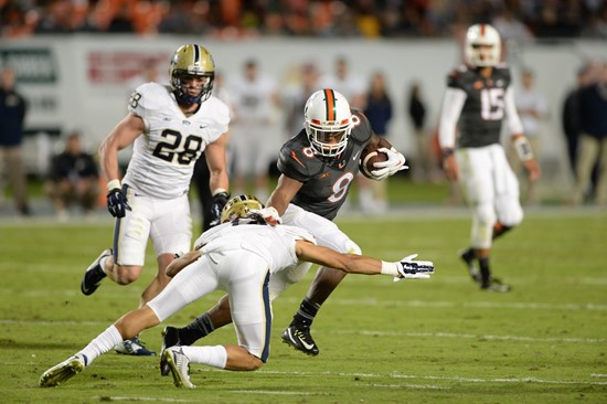University of Miami Hurricanes running back Duke Johnson #8 plays in a game against The Pittsburgh Panthers at Sun Life Stadium on November 29, 2014. ...