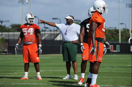 University of Miami Defenisve Line Coach, Jethro Franklin, instructs his team on how he wants them to execute his game plan during a spring practice...