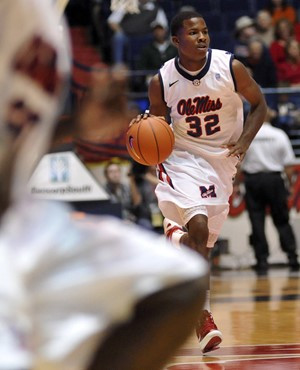 Mississippi's Jarvis Summers dribbles upcourt against Miami during an NCAA college basketball game in Oxford, Miss. on Friday, Nov. 25, 2011. (AP...