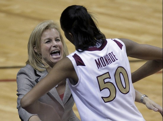 Florida State coach Sue Semrau, left, hugs Jacinta Monroe near the end of an NCAA college basketball game against Miami, Thursday, Feb. 25, 2010, in...