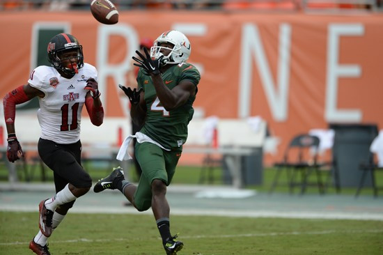 ass from quarterback Brad Kaaya in a game against the Arkansas State Red Wolves at Sun Life Stadium on September13, 2014. Photo by Steven & Matthew...