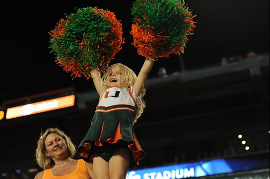 A University of Miami Hurricanes fan shows her team spirit in a game against the Ohio State Buckeyes at Sun Life Stadium on September 17, 2011. Photo...