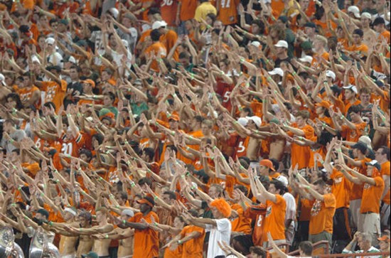 University of Miami students and fans cheer for the Hurricanes during a game against the Texas A&M Aggies at the Orange Bowl on September 20, 2007. ...