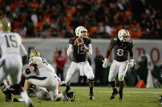 University of Miami Hurricanes quarterback Brad Kaaya #15 plays in a game against The Pittsburgh Panthers at Sun Life Stadium on November 29, 2014. ...