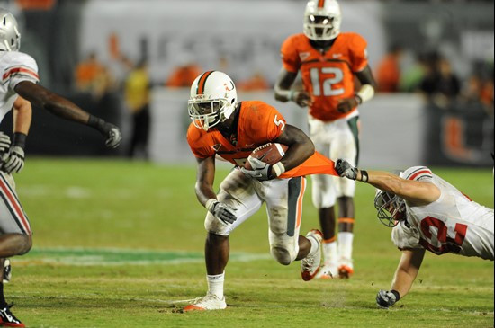 University of Miami Hurricanes running back Mike James #5 carries the ball against the Ohio State Buckeyes at Sun Life Stadium on September 17, 2011....