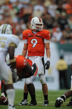 University of Miami Hurricanes quarterback Robert Marve #9 looks over the defense in a game against the University of Central Florida Knights at...