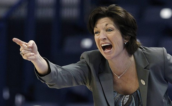 Miami coach Katie Meier motions toward the court in the second half of an NCAA tournament first-round women's college basketball game against Idaho...