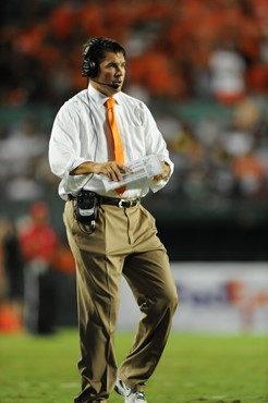 University of Miami Hurricanes head coach Al Golden calls in a play in a game against the Ohio State Buckeyes at Sun Life Stadium on September 17,...