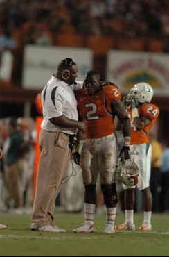 University of Miami linebacker Jon Beason #2 receives last minute instructions during a game against the Virginia Tech Hoakies at the Orange Bowl on...
