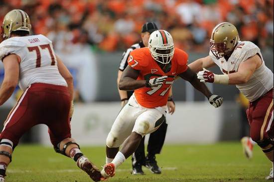 University of Miami Hurricanes defensive lineman Adewale Ojomo #97 plays in a game against the Boston College Eagles at Sun Life Stadium on November...