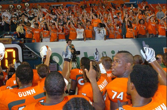 University of Miami Hurricanes head coach Randy Shannon and the team salute fans by singing the Alma Mater with them at the end of the game between...