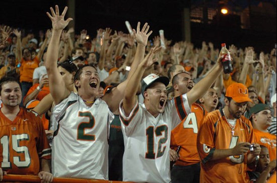 University of Miami students and fans cheer for the Hurricanes during a game against the Texas A&M Aggies at the Orange Bowl on September 20, 2007. ...