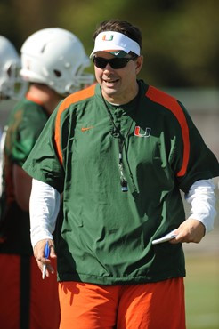 University of Miami Head Coach, Al Golden, instructs his team on how he wants them to execute his game plan during a spring practice at Greentree...