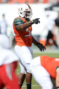 University of Miami Hurricanes linebacker Denzel Perryman #52 plays in a game against the Cincinnati Bearcats at Sun Life Stadium on October 11, 2014....