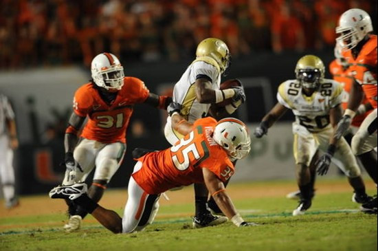 University of Miami Hurricanes defensive lineman Olivier Vernon #35 sacks the quarterback in a game against the Georgia Tech Yellow Jackets at Land...