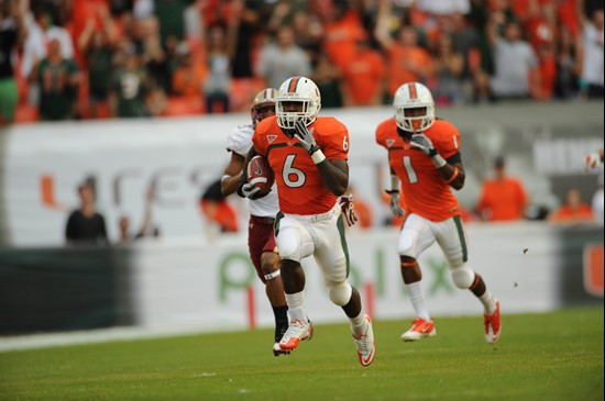 University of Miami Hurricanes running back Lamar Miller #6 carries the ball against the Boston College Eagles at Sun Life Stadium on November 25,...