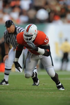 University of Miami Hurricanes defensive lineman Allen Bailey #57 rushes in a game against the University of Central Florida Knights at Dolphin...