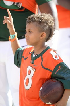 University of Miami Hurricane fan Carter Huck had his dream come true as he got to walk through a tunnel of smoke with Sebastian the Ibis and the...