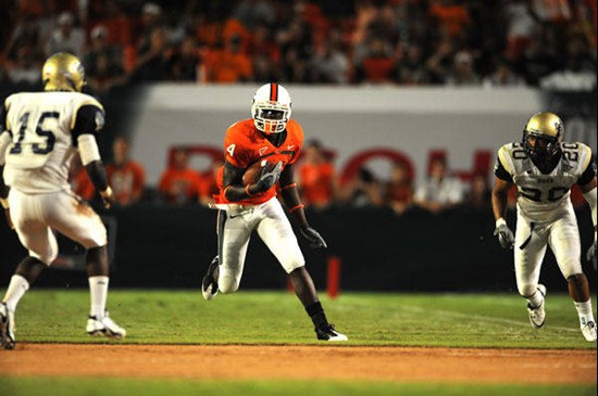 University of Miami Hurricanes wide receiver Aldarius Johnson #4 catches a pass against Charleston Southern University in the Canes inaugural game at...