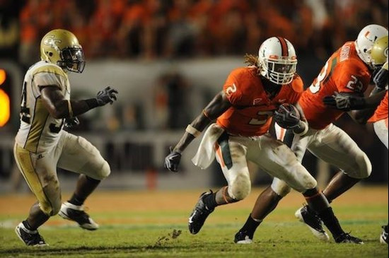 University of Miami Hurricanes running back Graig Cooper #2 rushes in a game against the Georgia Tech Yellow Jackets at Land Shark Stadium on...