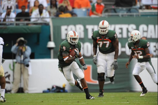 University of Miami Hurricanes running back Javarris James #5 carries the ball against the Deamon Deacons of Wake Forest at Dolphin Stadium on October...