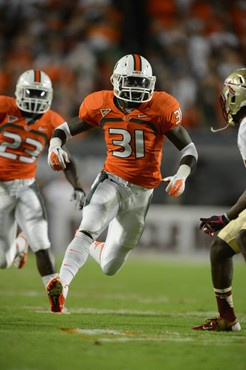 University of Miami Hurricanes linebacker Tyrone Cornileus #31 plays in a game against the Florida State Seminoles at Sun Life Stadium on October 20,...