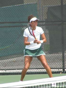 Danielle Mills awaiting a return Saturday at the Neil Schiff Tennis Center.