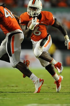 University of Miami Hurricanes running back Lamar Miller #6 carries the ball against the Ohio State Buckeyes at Sun Life Stadium on September 17,...