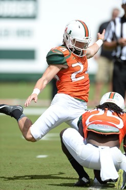 University of Miami Hurricanes Kicker/Punter Michael Badgley #24 plays in a game against the Cincinnati Bearcats at Sun Life Stadium on October 11,...