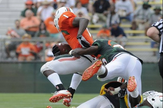 Storm Johnson is tackled from behind at the 2011 Miami Hurricanes Spring Football Game @ Lockhart Stadium