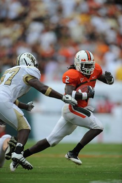 University of Miami Hurricanes running back Graig Cooper #2 carried the ball 23 times for 90 yards and caught 3 passes for 9 yards in a game against...