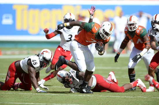 University of Miami Hurricanes running back Duke Johnson #8 plays in a game against the Cincinnati Bearcats at Sun Life Stadium on October 11, 2014.  ...