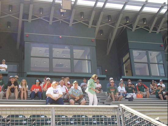 Fans use the new press box as shade during Home Run Derby
