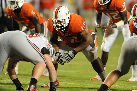University of Miami Hurricanes offensive lineman Harland Gunn #66 gets set to block in a game against the Ohio State Buckeyes at Sun Life Stadium on...