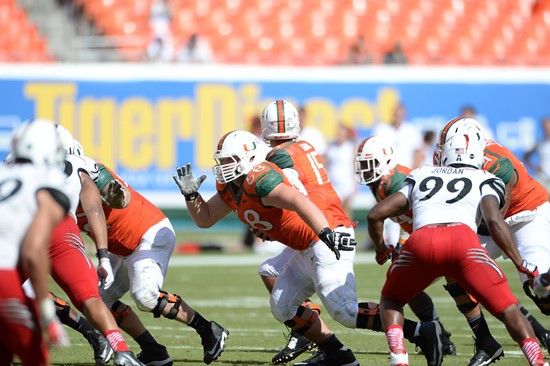 University of Miami Hurricanes offensive lineman Nick Linder #68 plays in a game against the Cincinnati Bearcats at Sun Life Stadium on October 11,...